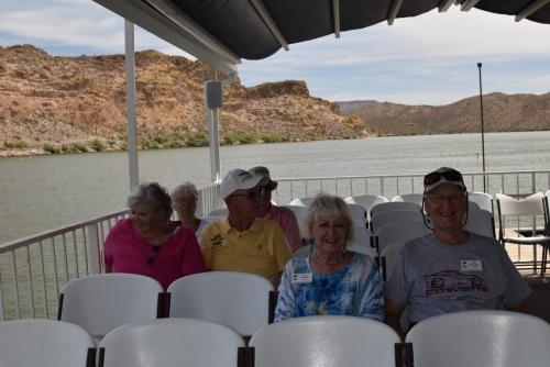 on the top deck of the boat